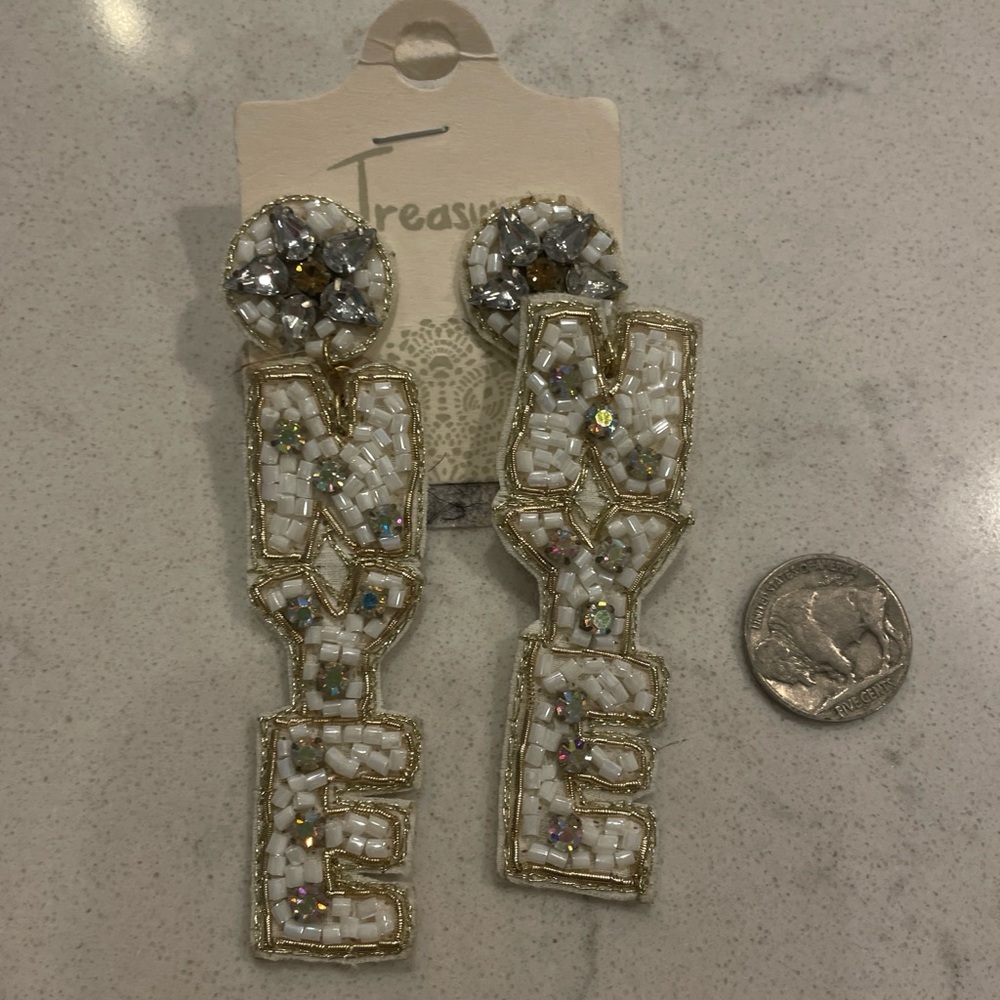 Treasure NYE white beaded earrings for your holiday on New Year’s Eve!